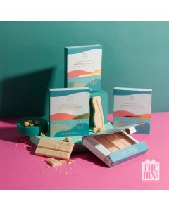 Ciocolata alba cu alune de padure intregi, Tastelanghe, 110g