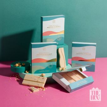 Ciocolata alba cu alune de padure intregi, Tastelanghe, 110g